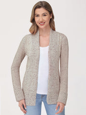 Woman wearing a beige cardigan over a white shirt on a white background