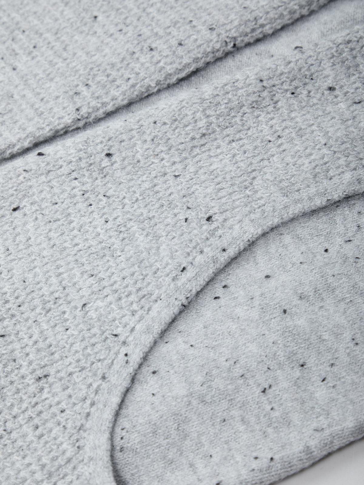 Close-up of gray concrete pavement with visible texture