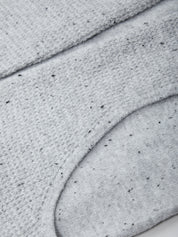 Close-up of gray concrete pavement with visible texture