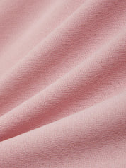 Close-up of pink fabric with a soft texture