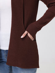 Brown knitted cardigan worn by a person on a white background