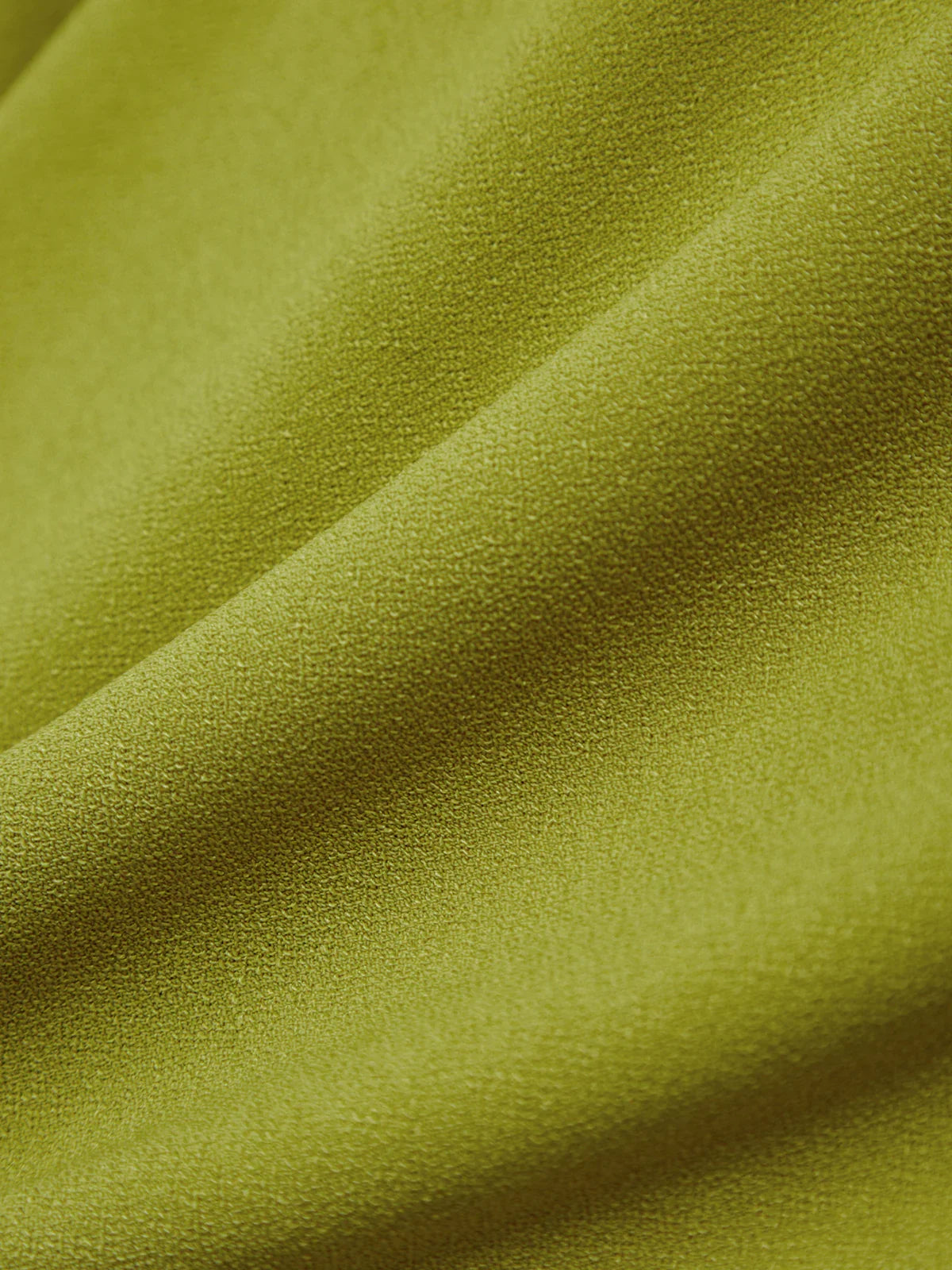 Close-up of green fabric with visible texture