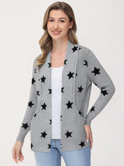 Woman wearing a gray cardigan with black star patterns on a white background