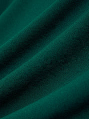 Close-up of teal fabric with a textured surface