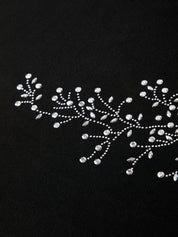 Rhinestone embroidery on a black background