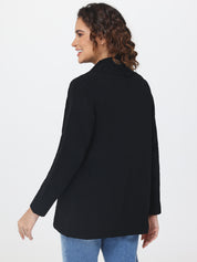 Woman wearing a black cardigan on a white background