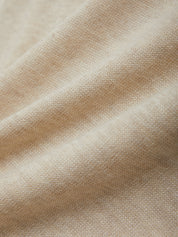 Close-up of beige fabric texture