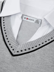 Gray sweater with black trim and a visible brand label on a white background