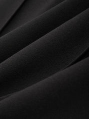 Close-up of black fabric with folds