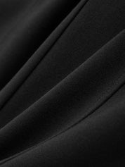 Close-up of black fabric with folds