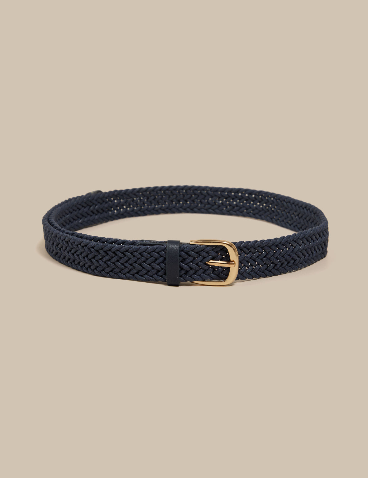 Navy braided belt with a gold buckle on a beige background