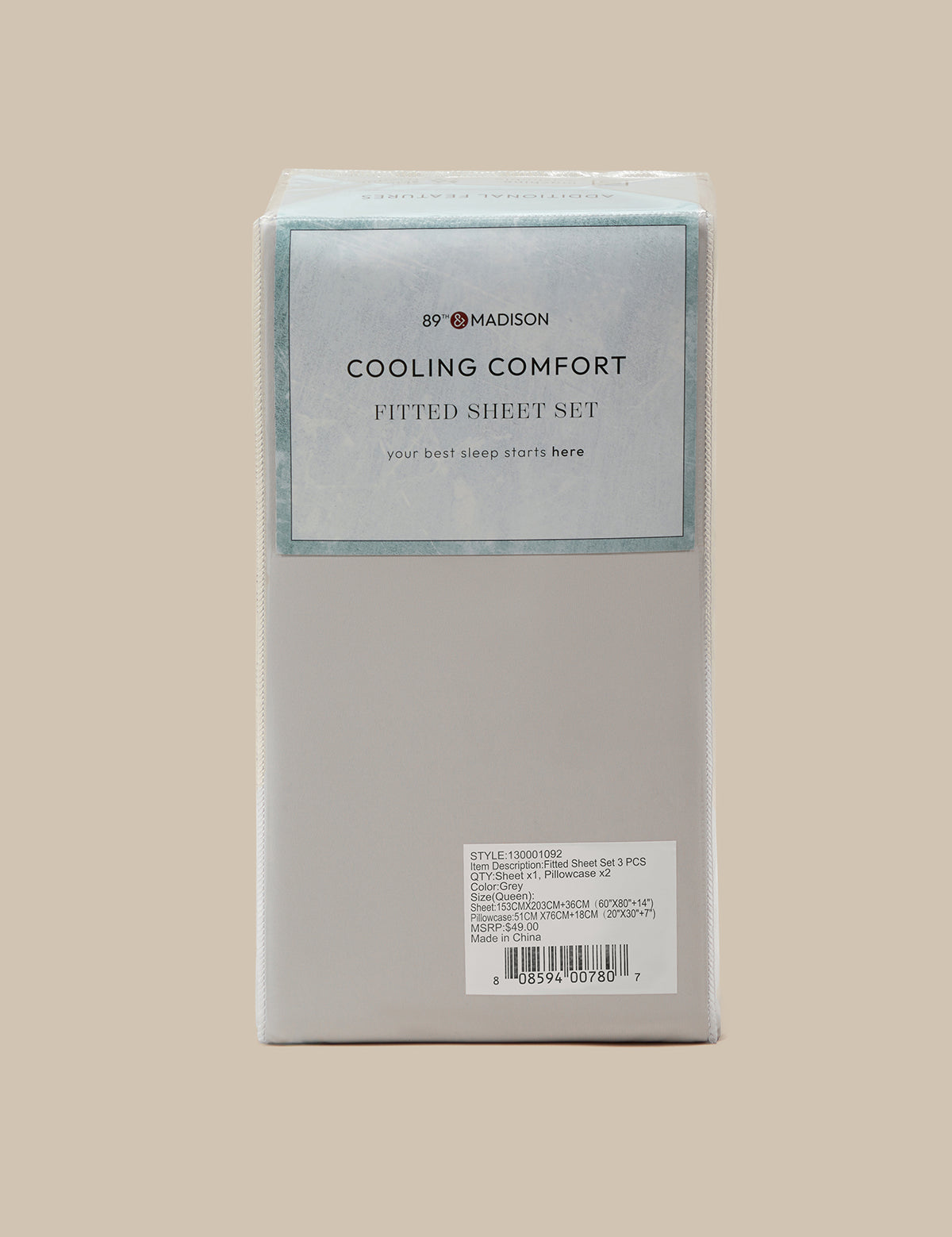 A boxed fitted sheet set by 8Y MADISON, labeled 'COOLING COMFORT FITTED SHEET SET,' shown upright against a plain warm beige background.