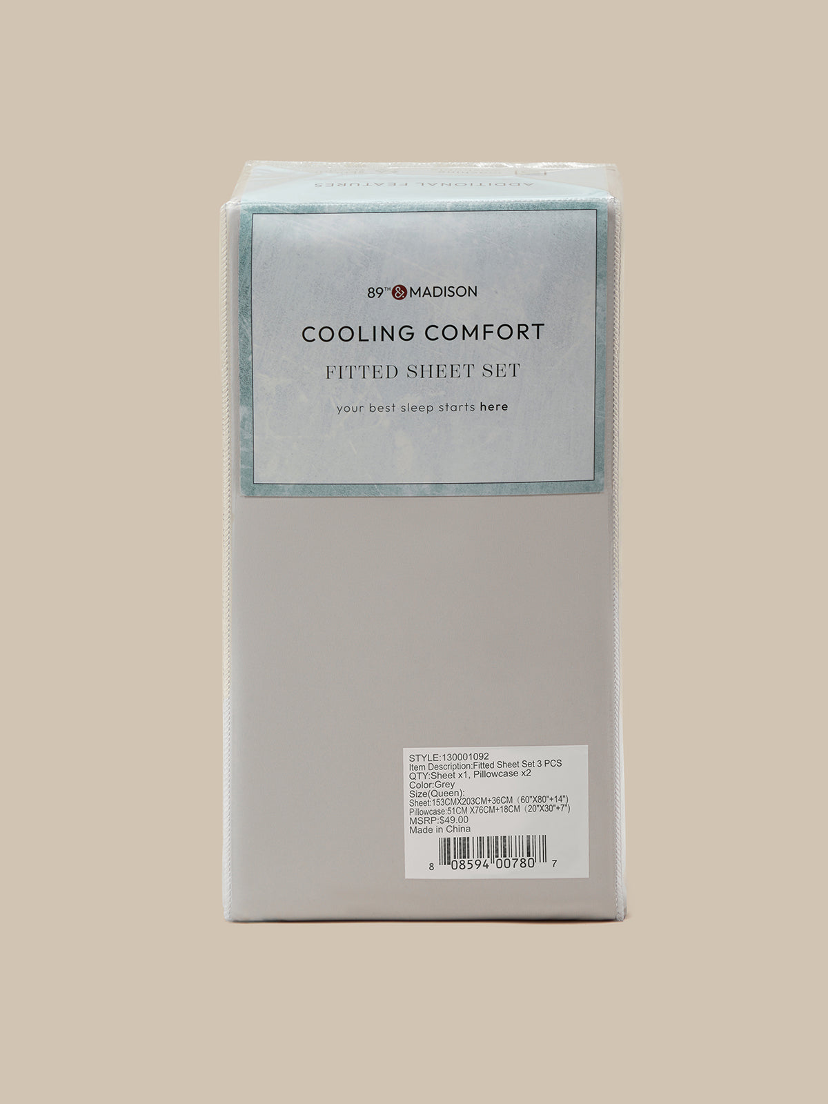 A boxed fitted sheet set by 8Y MADISON, labeled 'COOLING COMFORT FITTED SHEET SET,' shown upright against a plain warm beige background.