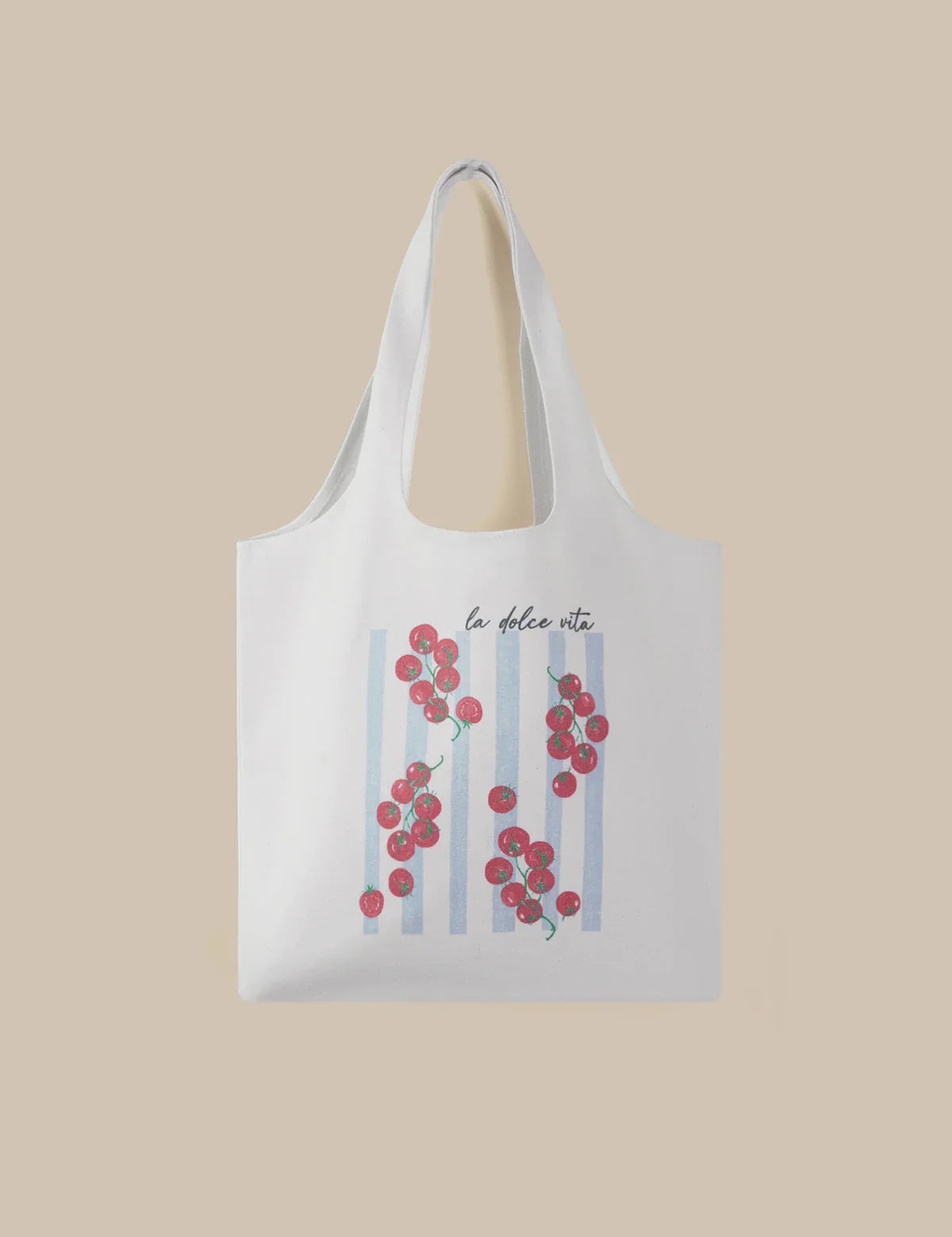 White tote bag with floral design and text on a beige background