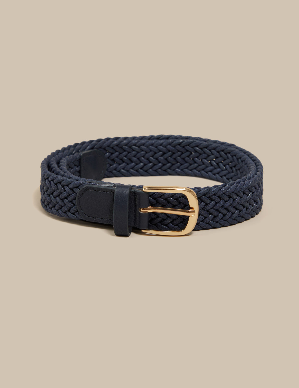 Navy braided belt with a gold buckle on a beige background