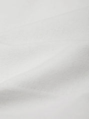 Close-up of a textured silver surface