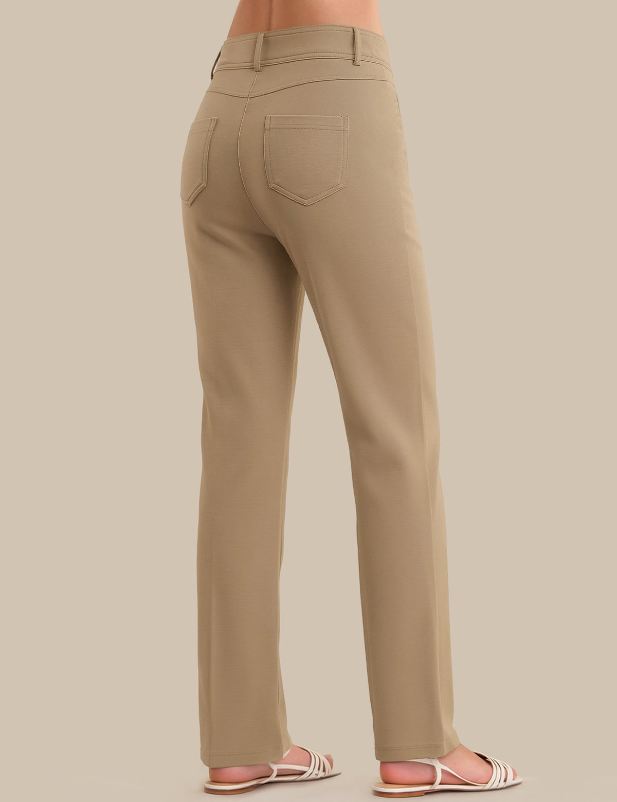 Beige pants on a neutral background