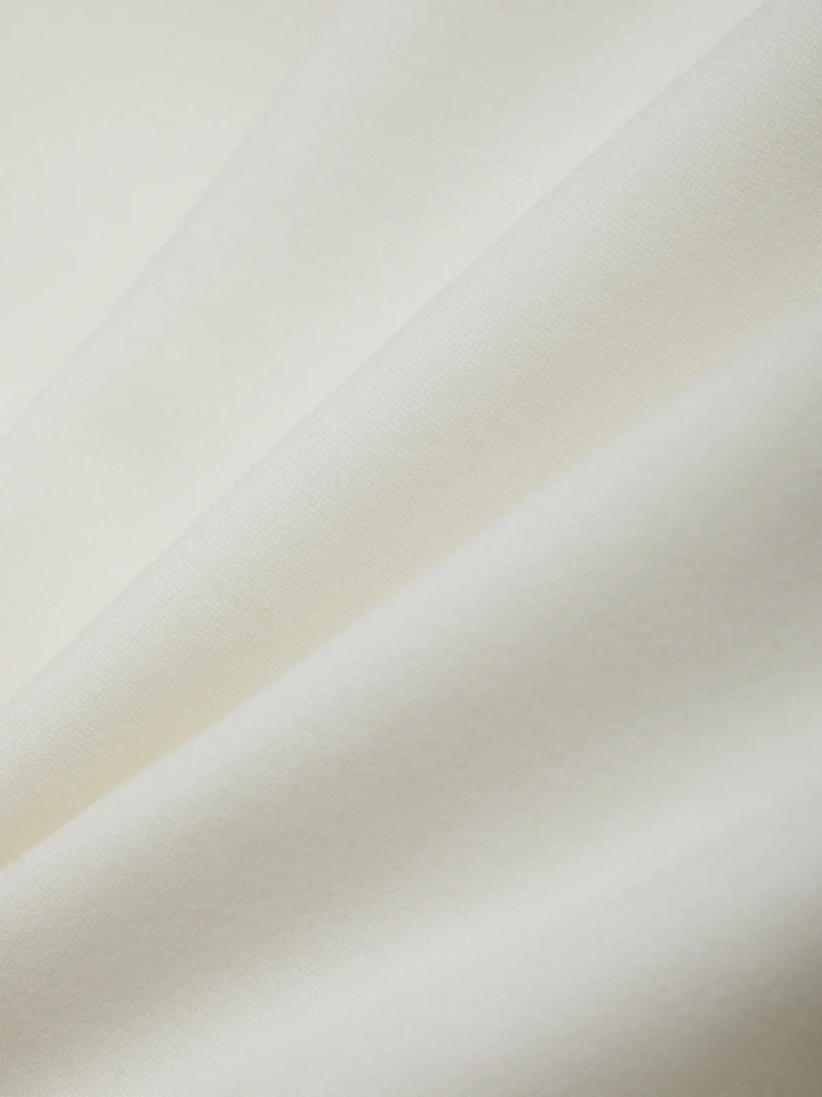 Close-up of a beige fabric texture