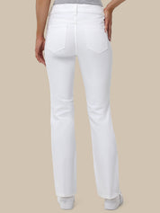 White pants worn by a person on a beige background
