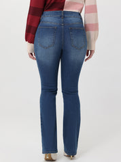 Person wearing blue jeans on a white background