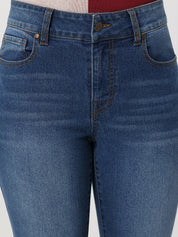 Close-up of blue jeans on a gray background