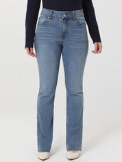 Person wearing light blue jeans on a white background