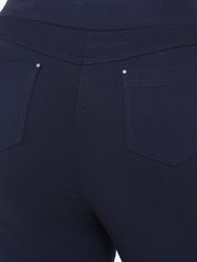 Close-up of dark blue pants with two front pockets.