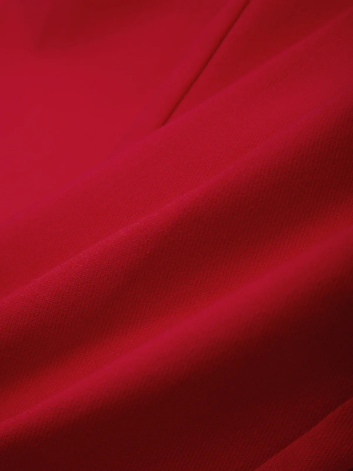 Close-up of red fabric with folds