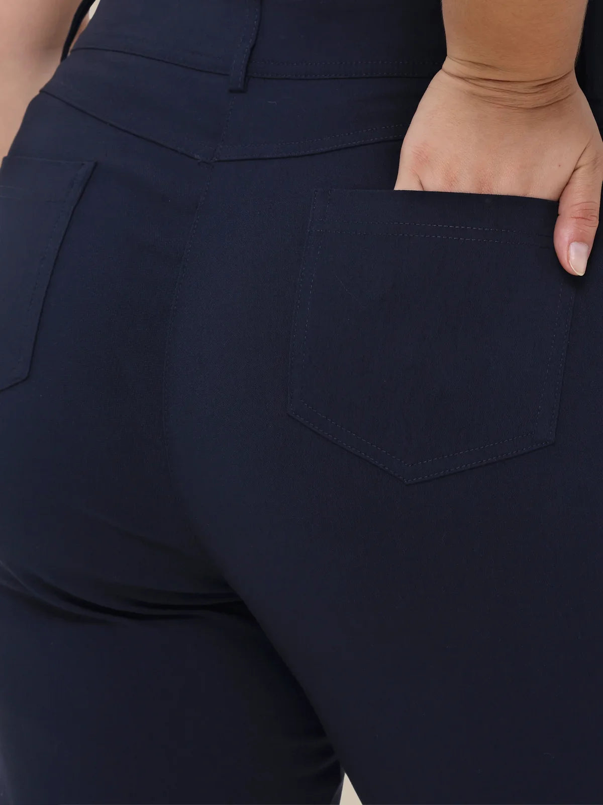 Navy blue pants with a pocket detail