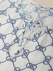 White garment with blue knot pattern and 'Madison' label on a white background