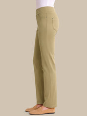 Khaki pants worn by a person on a beige background