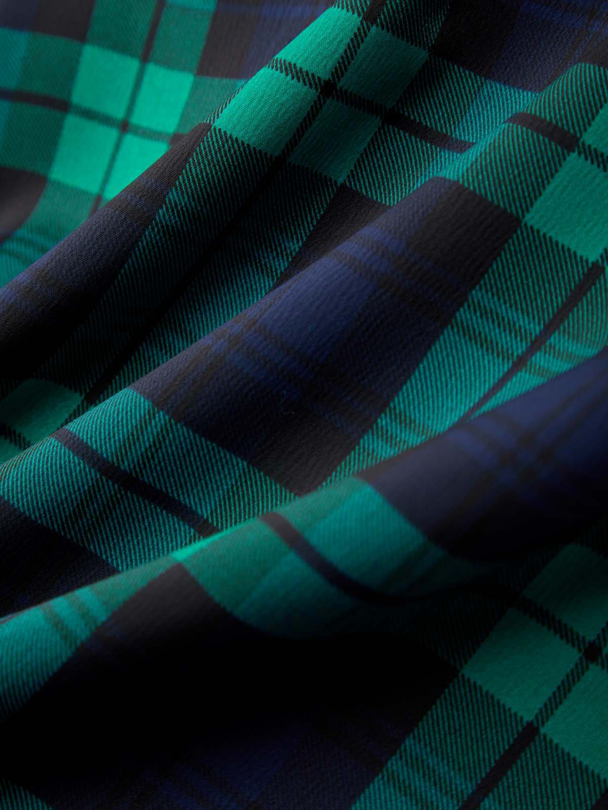 Close-up of green and black plaid fabric