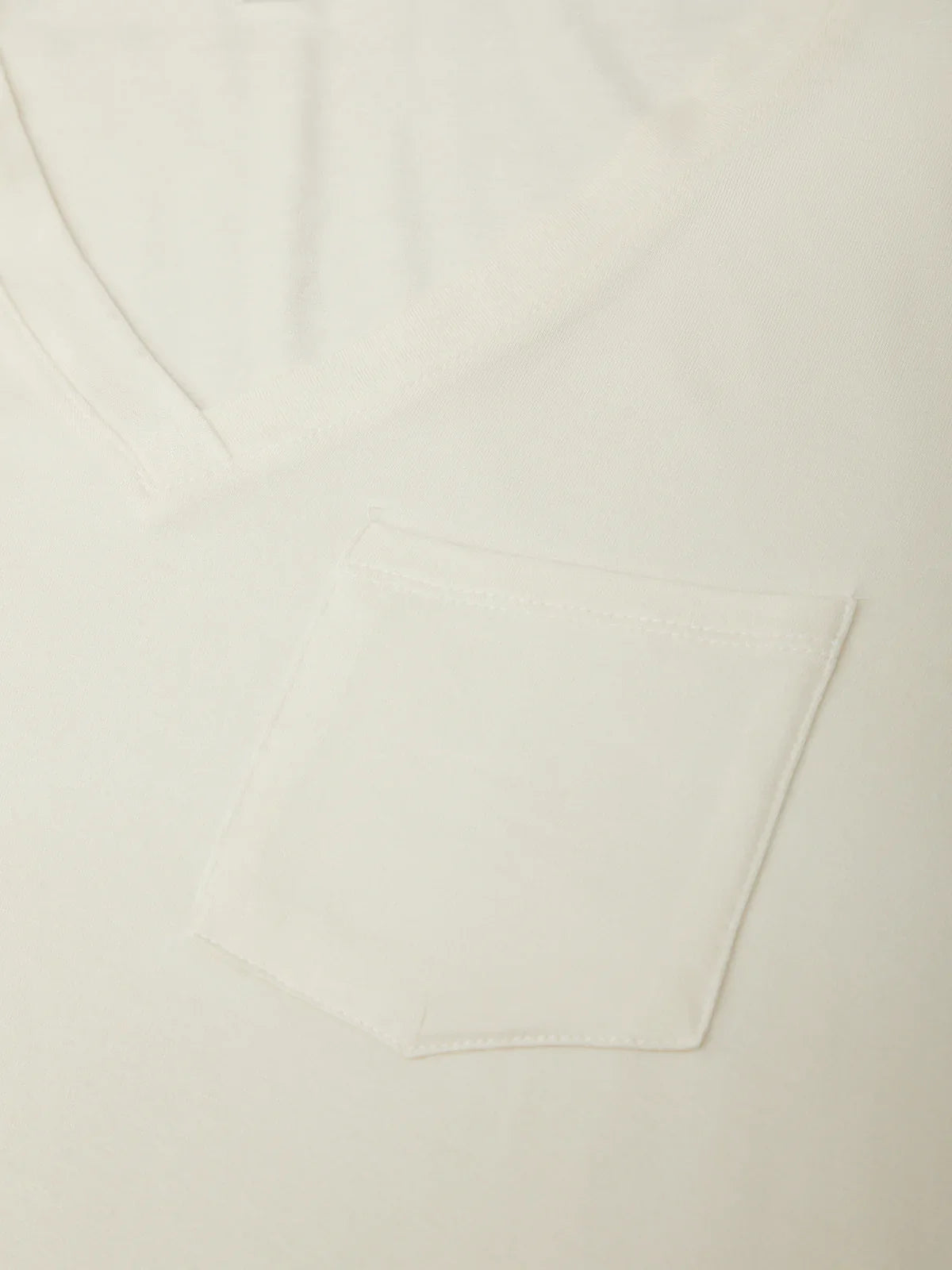 Close-up of a beige fabric texture