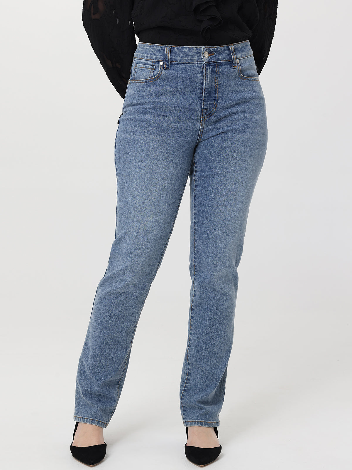 Light blue jeans worn by a person on a white background