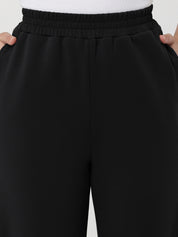 Black pants with a white background