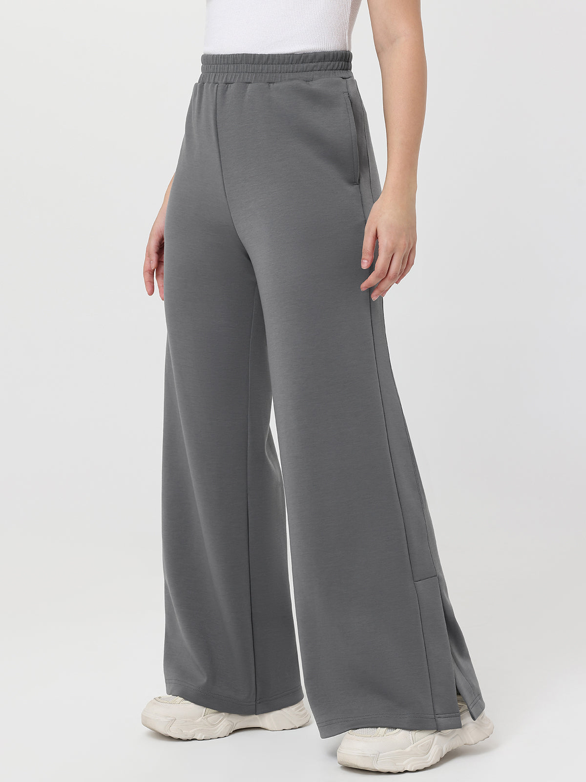 Gray wide-leg pants worn by a person on a white background