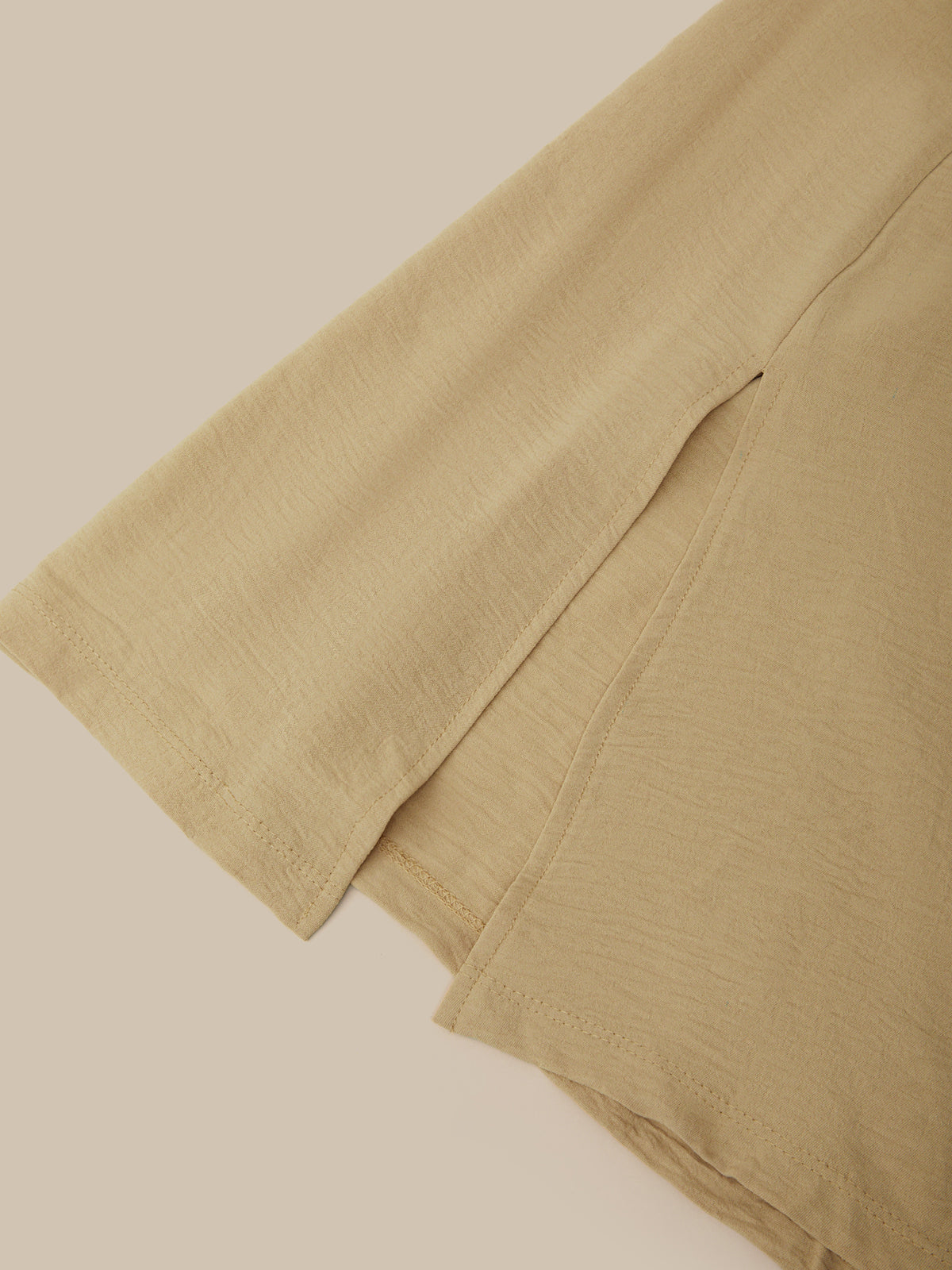 Close-up of beige fabric on a beige background