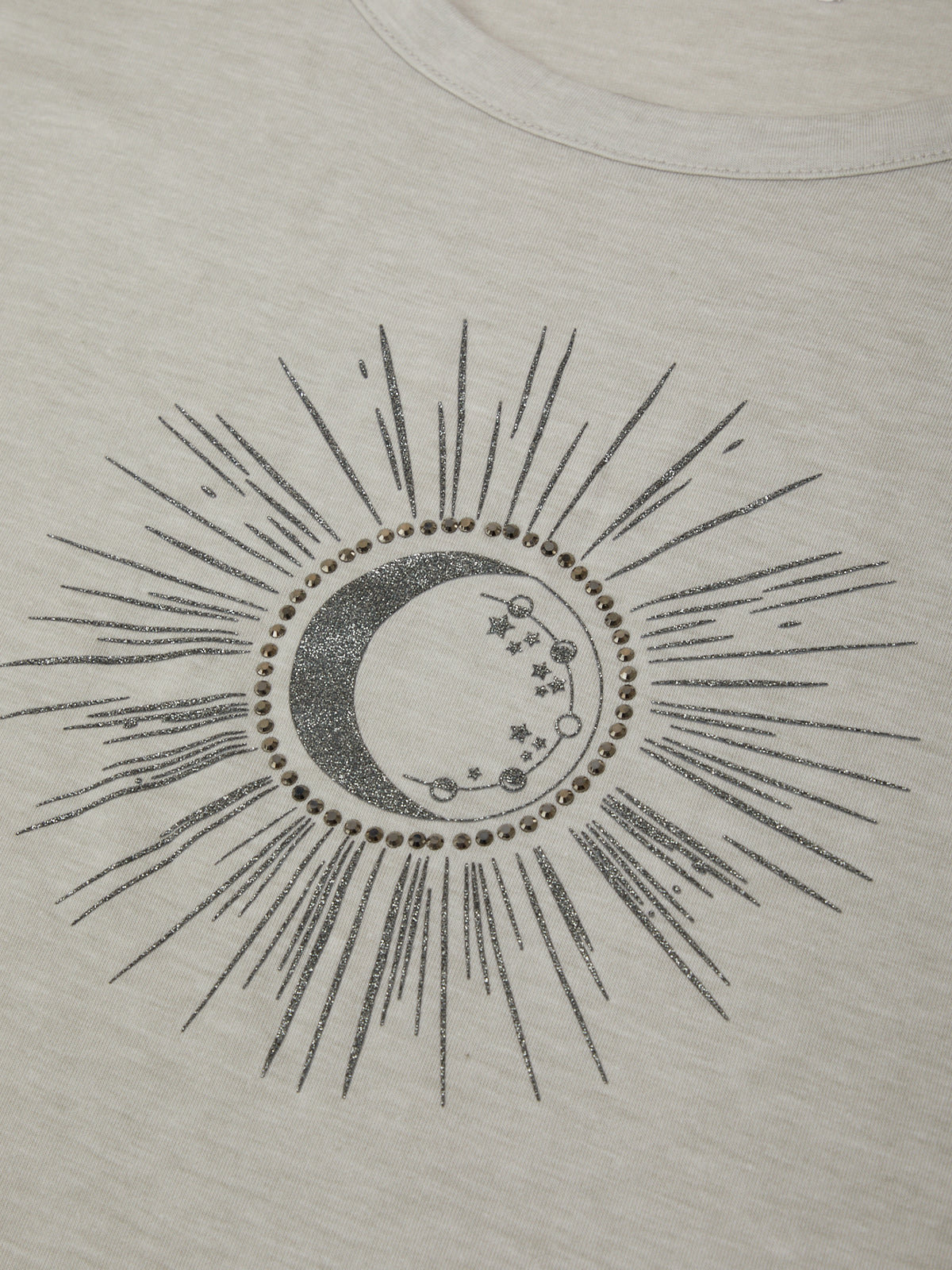 Design of a sun and moon with stars on a beige background