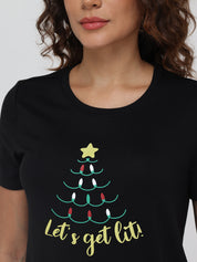 Black t-shirt with Christmas tree design and 'Let's get lit!' text on a plain background