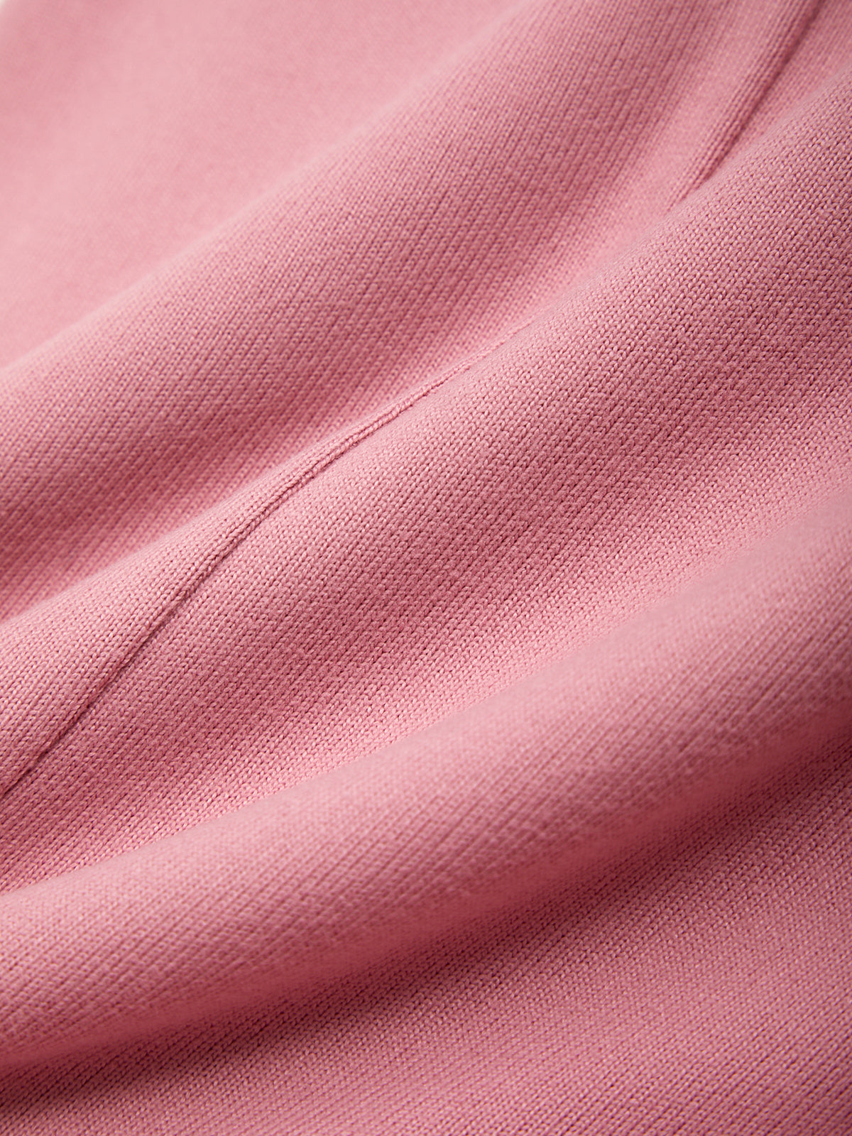 Close-up of pink fabric with visible texture