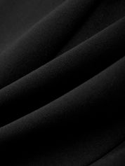 Close-up of black fabric with a textured surface