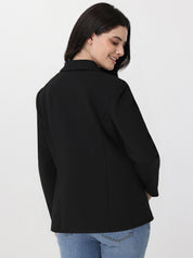 Woman wearing a black jacket on a white background