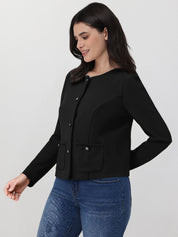 Woman wearing a black jacket and blue jeans on a white background