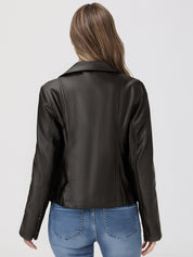 Person wearing a black leather jacket and blue jeans on a white background