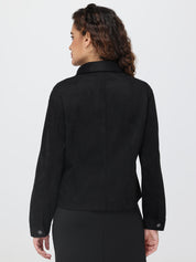 Person wearing a black jacket on a white background