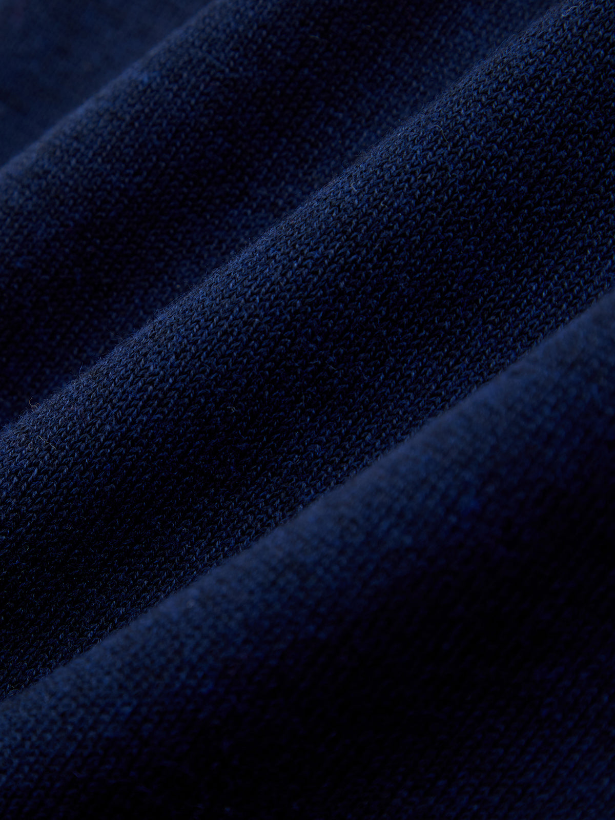 Close-up of blue fabric with a textured pattern