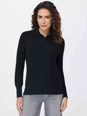 Woman wearing a black long-sleeve polo shirt against a white background