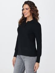 Woman wearing a black long-sleeve shirt on a white background