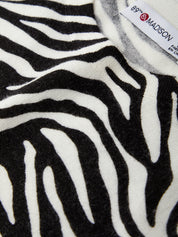 Zebra pattern fabric with a visible label in the corner