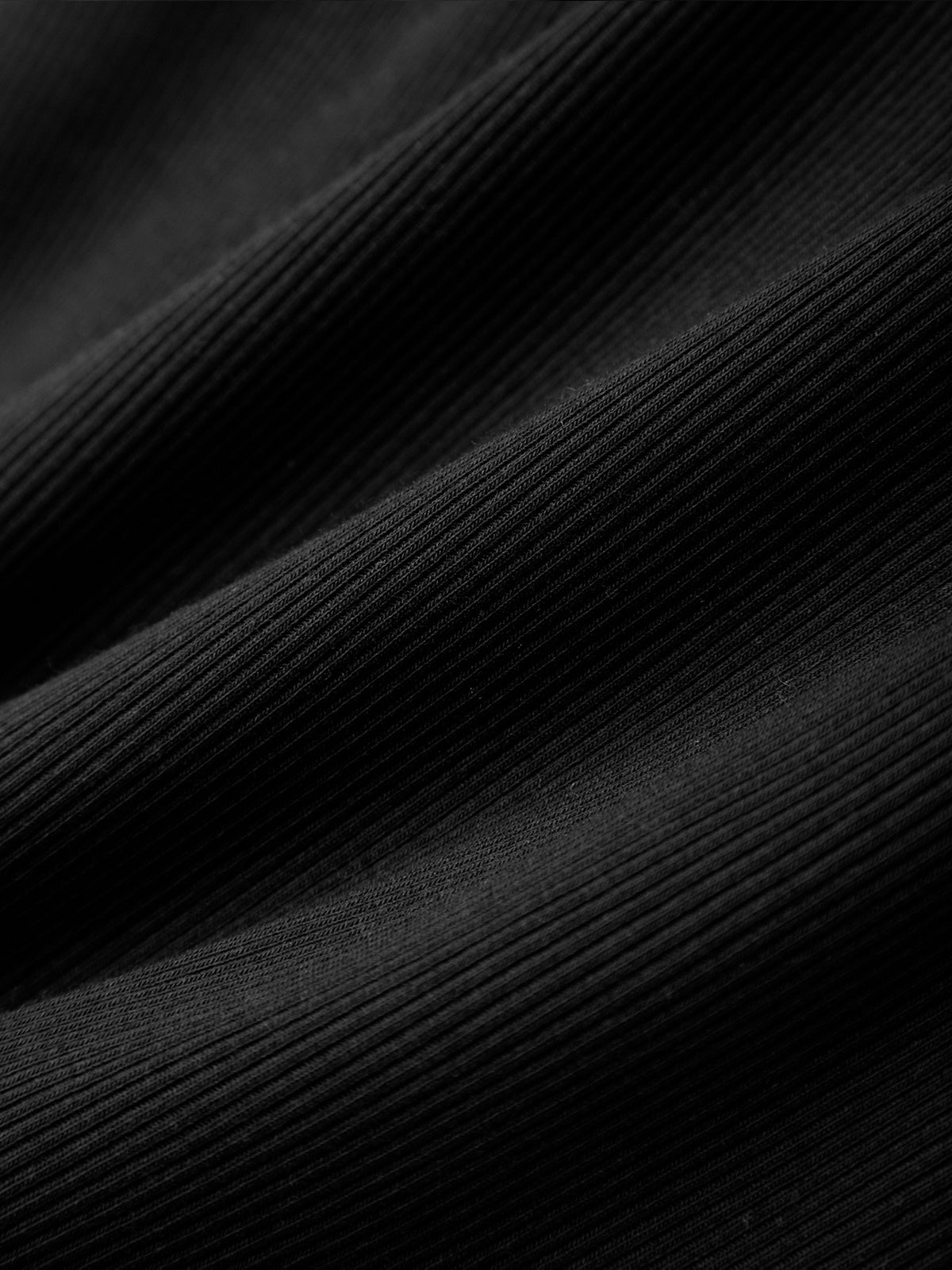 Black and white textured fabric pattern